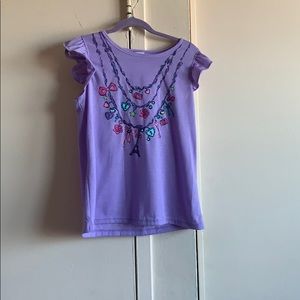 A purple kids shirt